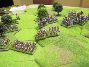 The Yorkist mounted men at arms switch from left to right behind the longbow.