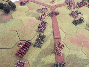 The barbarian heavy cavalry threaten the ballistae, whilst the giants continue on