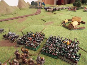 The orcs watch as the elven cavalry continue their apparent retreat