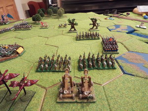 The spearmen charge in. The Treemen loom in the background